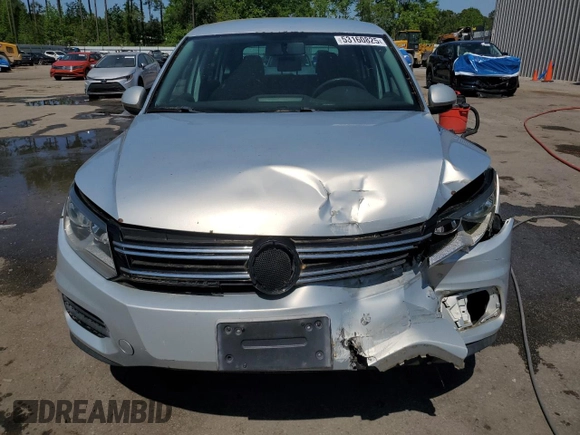 2012 Volkswagen Tiguan SE z VIN WVGAV7AX6CW543053, wystawiony jako Copart lot #53160825 z przebiegiem 167 185 mil mil oraz Szkody całkowita. Historia ofert i sprzedaży dostępna na DreamBid. Obrazek 12.