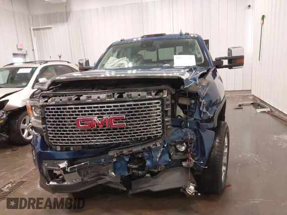 2015 GMC Sierra 2500HD Denali z VIN 1GT120E86FF655301, wystawiony jako IAAI lot #41965001 z przebiegiem 74 136 mil mil oraz . Historia ofert i sprzedaży dostępna na DreamBid. Obrazek 13.