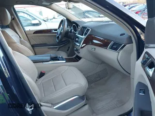 2016 Mercedes-Benz GL with VIN 4JGDF7DE2GA661379, listed as a IAAI auction lot 41059705 with 60,558 mi miles. Bid and sale history available at carsss.com. Image 5.