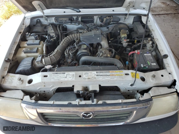 2000 Mazda B-Series 2WD Truck SE with VIN 4F4YR16C6YTM11839, listed as a Copart auction lot 64460754 with 245,958 mi miles and Salvage Title. Bid and sale history available at carsss.com. Image 12.