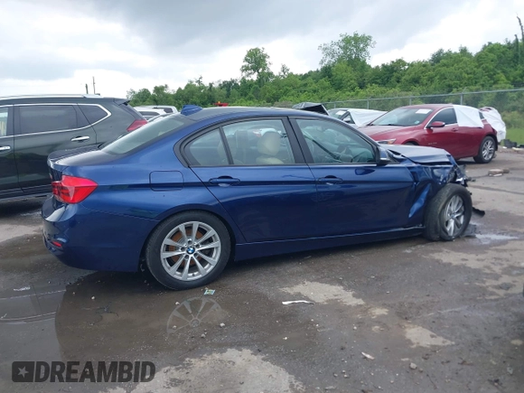 2017 BMW 3 Series 320i z VIN WBA8E1G3XHNU15607, wystawiony jako IAAI lot #42117103 z przebiegiem Nie podano mil oraz . Historia ofert i sprzedaży dostępna na DreamBid. Obrazek 12.