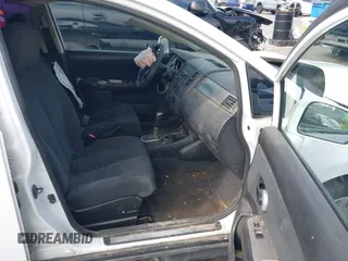 2011 Nissan Versa 1.8 S with VIN 3N1BC1CP6BL479113, listed as a IAAI auction lot 42058427 with 133,841 mi miles. Bid and sale history available at carsss.com. Image 5.