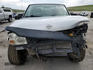 2004 Nissan Frontier XE Desert Runner with VIN 1N6ED26Y44C402138, listed as a Copart auction lot 58828425 with 125,143 mi miles and Salvage title. Bid and sale history available at DreamBid. Image 5.
