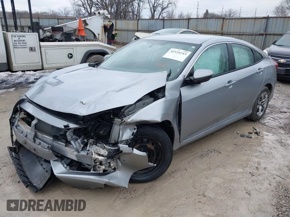 2017 Honda Civic LX z VIN 2HGFC2F51HH562496, wystawiony jako IAAI lot #41524243 z przebiegiem Nie podano mil oraz . Historia ofert i sprzedaży dostępna na DreamBid. Obrazek 2.