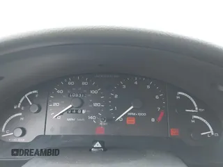 1995 Ford Probe z VIN 1ZVLT22B7S5124333, wystawiony jako IAAI lot #42259542 z przebiegiem 109 313 mil mil oraz . Historia ofert i sprzedaży dostępna na DreamBid. Obrazek 7.