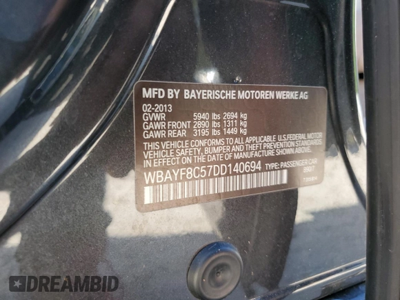 2013 BMW 7 Series 750Li xDrive with VIN WBAYF8C57DD140694, listed as a Copart auction lot 56983435 with 113,444 mi miles and Salvage title. Bid and sale history available at DreamBid. Image 12.