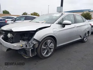 2018 Honda Clarity Touring with VIN JHMZC5F32JC014588, listed as a IAAI auction lot 42066633 with 89,316 mi miles. Bid and sale history available at carsss.com. Image 2.