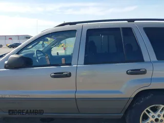 2002 Jeep Grand Cherokee with VIN 1J8GW48N72C207838, listed as a IAAI auction lot 42020294 with 181,283 mi miles and . Bid and sale history available at DreamBid. Image 15.