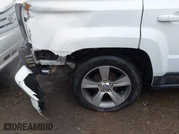 2016 Jeep Patriot Latitude with VIN 1C4NJPFAXGD749306, listed as a IAAI auction lot 41474439 with 94,767 mi miles and . Bid and sale history available at DreamBid. Image 20.