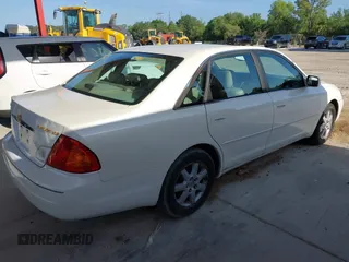 2001 Toyota Avalon XL z VIN 4T1BF28B01U142721, wystawiony jako IAAI lot #42340748 z przebiegiem 204 644 mil mil oraz . Historia ofert i sprzedaży dostępna na DreamBid. Obrazek 4.