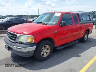 2003 Ford F-150 XL with VIN 1FTRX17243NA84413, listed as a IAAI auction lot 42132813 with 190,715 mi miles. Bid and sale history available at carsss.com. Image 2.