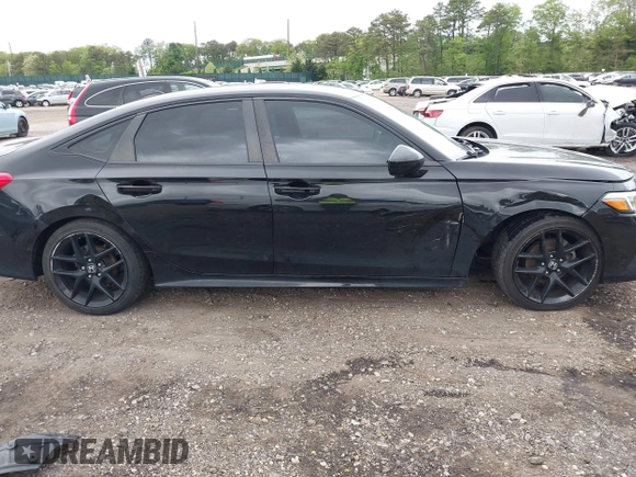 2022 Honda Civic Sport z VIN 2HGFE2F52NH552470, wystawiony jako IAAI lot #42315098 z przebiegiem 55 292 mil mil oraz . Historia ofert i sprzedaży dostępna na DreamBid. Obrazek 6.