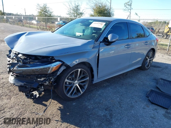2024 Honda Civic Sedan Touring with VIN 2HGFE1F9XRH308973, listed as a IAAI auction lot 41643985 with 5,842 mi miles. Bid and sale history available at carsss.com. Image 2.