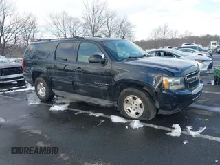 2014 Chevrolet Suburban LT with VIN 1GNSKJE79ER112014, listed as a IAAI auction lot 41384706 with 257,484 mi miles and . Bid and sale history available at DreamBid. Image 1.