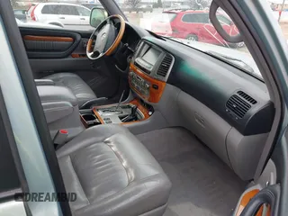 2004 Lexus LX 470 z VIN JTJHT00W143546192, wystawiony jako IAAI lot #41673810 z przebiegiem 232 196 mil mil oraz . Historia ofert i sprzedaży dostępna na DreamBid. Obrazek 5.