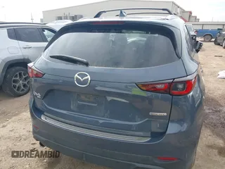 2023 Mazda CX-5 S Carbon Edition z VIN JM3KFBCM6P0288402, wystawiony jako IAAI lot #41682386 z przebiegiem 30 482 mil mil oraz . Historia ofert i sprzedaży dostępna na DreamBid. Obrazek 16.