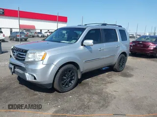 2013 Honda Pilot Touring with VIN 5FNYF3H95DB032438, listed as a IAAI auction lot 41865938 with 298,973 mi miles and . Bid and sale history available at DreamBid. Image 18.