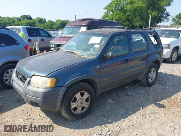 2001 Ford Escape XLT with VIN 1FMYU04131KA35322, listed as a IAAI auction lot 42584785 with 134,838 mi miles and . Bid and sale history available at DreamBid. Image 2.