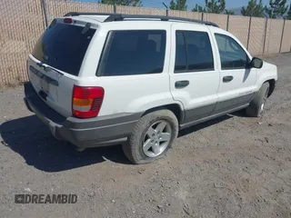 2004 Jeep Grand Cherokee Laredo with VIN 1J4GX48SX4C151160, listed as a IAAI auction lot 42765441 with 176,179 mi miles and . Bid and sale history available at DreamBid. Image 4.