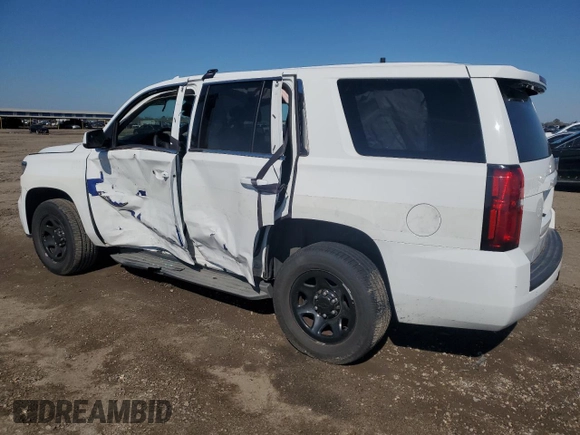 2015 Chevrolet Tahoe Commercial with VIN 1GNLC2EC2FR571987, listed as a Copart auction lot 45346895 with 106,708 mi miles and Salvage title. Bid and sale history available at DreamBid. Image 2.