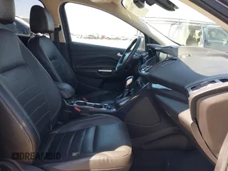 2014 Ford Escape Titanium с VIN 1FMCU0J95EUC22897, выставлен на аукционе IAAI как лот 42204135 с пробегом 144 534 миль миль и . История ставок и продаж доступна на DreamBid. Изображение 5.