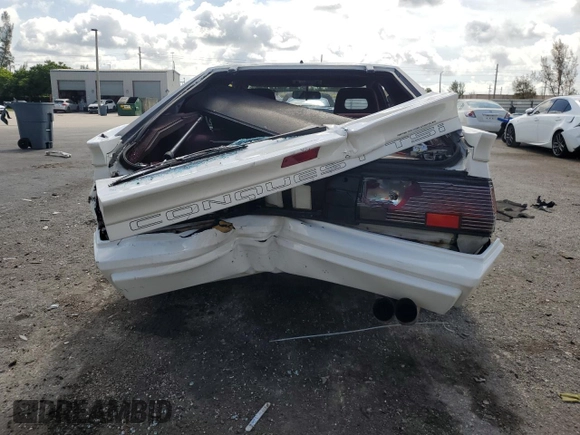 1988 Chrysler Conquest z VIN JJ3CC54N7JZ039025, wystawiony jako Copart lot #66072584 z przebiegiem 79 407 mil mil oraz Szkody całkowita. Historia ofert i sprzedaży dostępna na DreamBid. Obrazek 6.