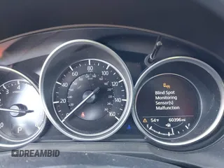 2019 Mazda CX-5 Sport with VIN JM3KFBBM6K1596402, listed as a IAAI auction lot 41971766 with 60,396 mi miles and . Bid and sale history available at DreamBid. Image 7.