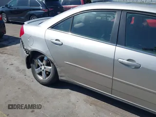 2005 Pontiac G6 GT z VIN 1G2ZH528754171686, wystawiony jako IAAI lot #42241991 z przebiegiem 168 361 mil mil oraz . Historia ofert i sprzedaży dostępna na DreamBid. Obrazek 6.