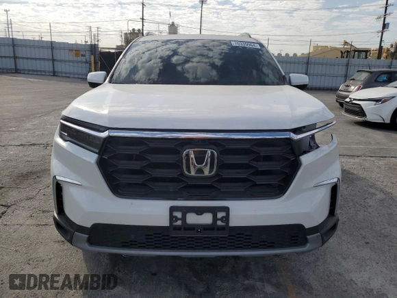 2023 Honda Pilot Elite with VIN 5FNYG1H82PB033222, listed as a Copart auction lot 70339964 with 28,347 mi miles and Salvage Title. Bid and sale history available at carsss.com. Image 5.