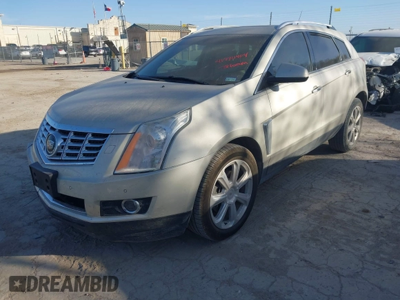 2014 Cadillac SRX Premium Collection with VIN 3GYFNDE37ES574109, listed as a IAAI auction lot 41770404 with 66,478 mi miles and . Bid and sale history available at DreamBid. Image 2.