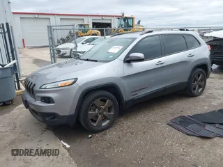 2016 Jeep Cherokee Latitude with VIN 1C4PJLCB5GW369955, listed as a IAAI auction lot 41297796 with 99,029 mi miles. Bid and sale history available at carsss.com. Image 2.
