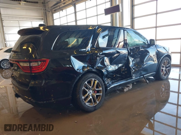 2021 Dodge Durango R/T with VIN 1C4SDJCT1MC788493, listed as a IAAI auction lot 41213673 with 80,287 mi miles and . Bid and sale history available at DreamBid. Image 4.