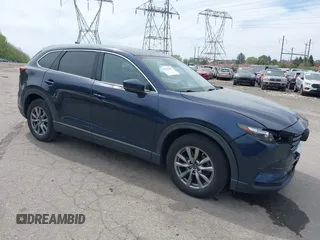 2019 Mazda CX-9 Touring z VIN JM3TCBCY1K0319032, wystawiony jako IAAI lot #42096688 z przebiegiem 69 004 mil mil oraz . Historia ofert i sprzedaży dostępna na DreamBid. Obrazek 1.