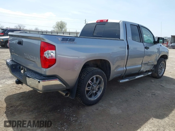 2018 Toyota Tundra 2WD SR with VIN 5TFRM5F16JX133735, listed as a IAAI auction lot 41818455 with 148,456 mi miles. Bid and sale history available at carsss.com. Image 4.