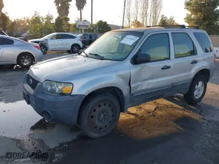 2007 Ford Escape XLS with VIN 1FMYU02Z07KB60389, listed as a IAAI auction lot 41135613 with 124,813 mi miles. Bid and sale history available at carsss.com. Image 2.