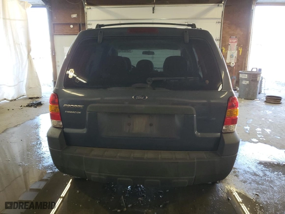 2006 Ford Escape XLS with VIN 1FMYU92Z56KA23659, listed as a Copart auction lot 76896374 with 0 mi miles and Salvage Title. Bid and sale history available at carsss.com. Image 6.