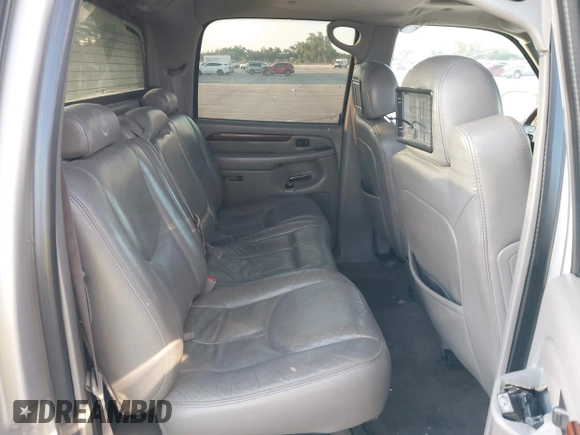 2004 Cadillac Escalade EXT z VIN 3GYEK62NX4G291260, wystawiony jako IAAI lot #41995991 z przebiegiem Nie podano mil oraz . Historia ofert i sprzedaży dostępna na DreamBid. Obrazek 8.