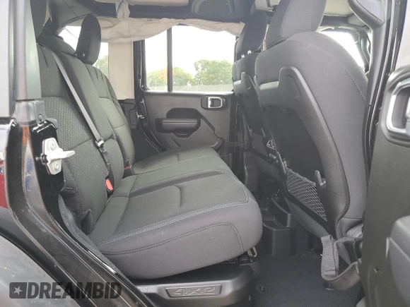 2024 Jeep Wrangler Rubicon z VIN 1C4RJXR6XRW291900, wystawiony jako Copart lot #61682885 z przebiegiem Nie podano mil oraz Szkoda całkowita • Salvage title. Historia ofert i sprzedaży dostępna na DreamBid. Obrazek 11.