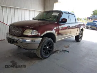 2001 Ford F-150 XLT with VIN 1FTRW08L91KA85396, listed as a IAAI auction lot 42525105 with 123,360 mi miles and . Bid and sale history available at DreamBid. Image 2.