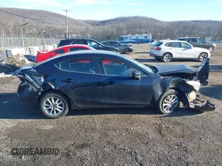2014 Mazda 3 i Touring with VIN JM1BM1V79E1136492, listed as a IAAI auction lot 41597192 with 116,283 mi miles and . Bid and sale history available at DreamBid. Image 13.