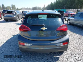 2017 Chevrolet Bolt EV Premier z VIN 1G1FX6S05H4190932, wystawiony jako IAAI lot #42422197 z przebiegiem 59 836 mil mil oraz . Historia ofert i sprzedaży dostępna na DreamBid. Obrazek 16.