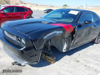 2013 Dodge Challenger R/T with VIN 2C3CDYBT4DH517881, listed as a IAAI auction lot 41422647 with 76,889 mi miles. Bid and sale history available at carsss.com. Image 6.