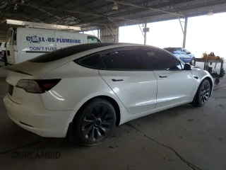 2021 Tesla Model 3 Long Range with VIN 5YJ3E1EB4MF938427, listed as a Copart auction lot 88270665 with 67,246 mi miles and Salvage Title. Bid and sale history available at carsss.com. Image 3.
