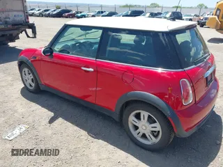 2006 MINI Hardtop with VIN WMWRC33556TK72619, listed as a IAAI auction lot 42328177 with 106,398 mi miles and . Bid and sale history available at DreamBid. Image 3.