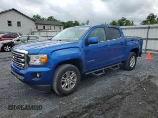2019 GMC Canyon 4WD SLE z VIN 1GTG6CEN1K1206640, wystawiony jako Copart lot #55339285 z przebiegiem 52 166 mil mil oraz Szkody całkowita. Historia ofert i sprzedaży dostępna na DreamBid. Obrazek 1.