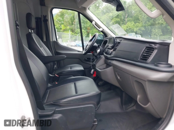 2022 Ford Transit Cargo with VIN 1FTBR1C85NKA74578, listed as a IAAI auction lot 42316744 with 63,376 mi miles and . Bid and sale history available at DreamBid. Image 5.