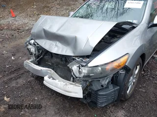 2010 Acura TSX with VIN JH4CU2F64AC031288, listed as a IAAI auction lot 42023406 with 144,192 mi miles. Bid and sale history available at carsss.com. Image 13.
