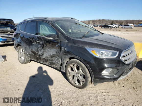 2018 Ford Escape Titanium with VIN 1FMCU9J95JUA36324, listed as a Copart auction lot 47131825 with 63,563 mi miles and Salvage title. Bid and sale history available at DreamBid. Image 4.