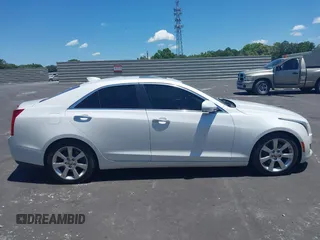 2016 Cadillac ATS Luxury Collection RWD z VIN 1G6AB5RX4G0133529, wystawiony jako IAAI lot #42314146 z przebiegiem 158 897 mil mil oraz . Historia ofert i sprzedaży dostępna na DreamBid. Obrazek 13.