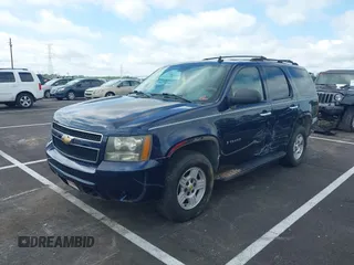 2007 Chevrolet Tahoe LTZ with VIN 1GNFC13J17R171865, listed as a IAAI auction lot 42472292 with 189,136 mi miles and . Bid and sale history available at DreamBid. Image 2.